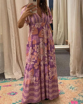 Blommig klänning med volangärmar